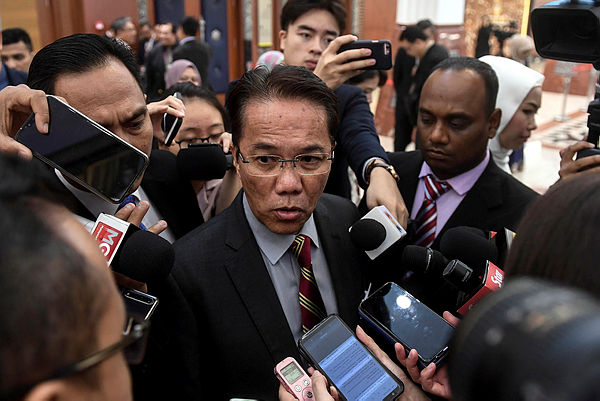 Minister in the Prime Minister Department Datuk Liew Vui Keong speaks to the media during the Dewan Rakyat sitting in Parliament on March 13, 2019. — Bernama