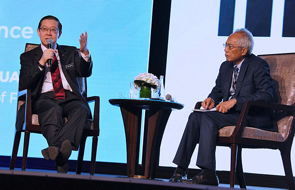 Finance Minister Lim Guan Eng (L) during a question-and-answers session at Invest Malaysia 2019 — Bernama