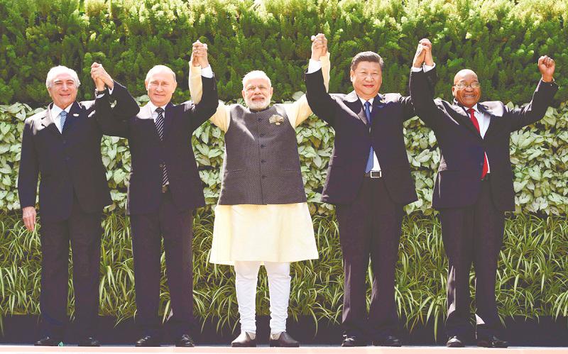 If India and China can reset their relationship, this will provide a model of conflict resolution and peaceful coexistence for members of BRICS. – AFPPIX