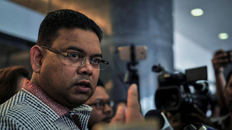 Lokman Adam, two others submit representation to drop charge