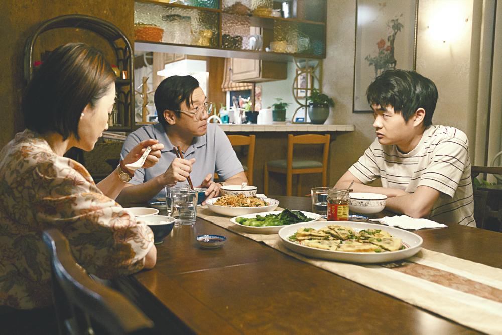 The Wang family drama strains under the pressure of everything in the story. – ALL PIX BY DISNEY+