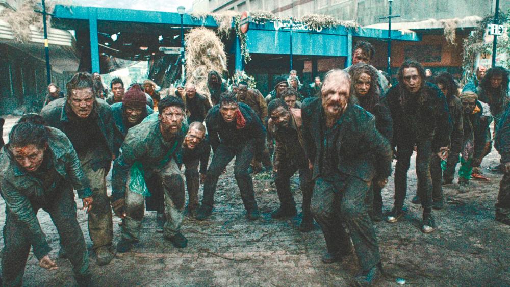 $!Be prepared for some terrible acting by the extras playing the zombies.
