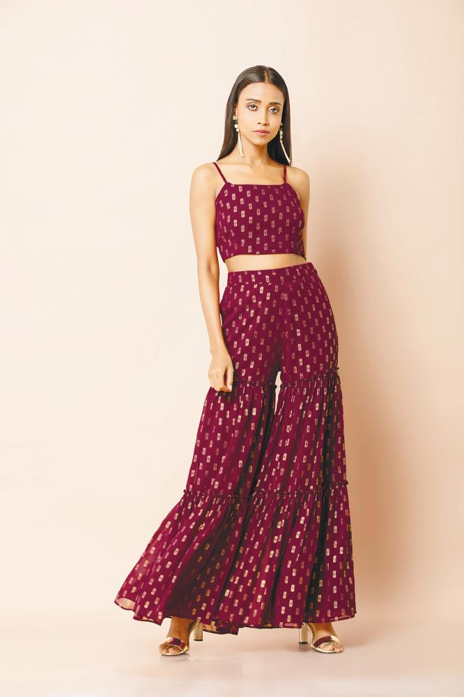 $!A crop top with tiered Sharara pants with an entirely unique look is hard to find. Pic provided by Indya or @indya_my