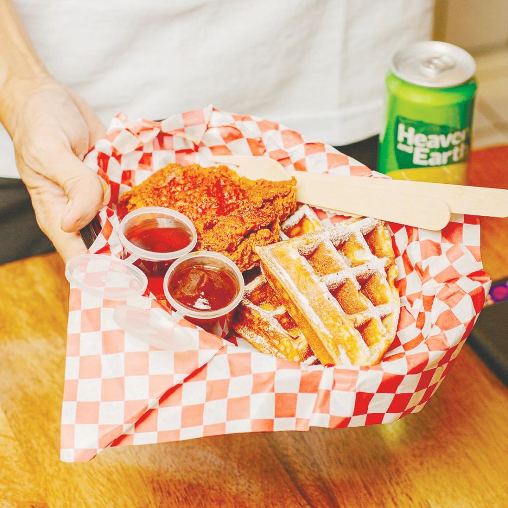 $!Waffles and fried chicken is a popular option on Fowlboys’s menu. – PIC FROM INSTAGRAM @FOWLBOYSKL