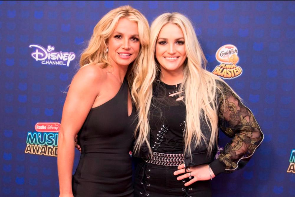 In happier times ... Britney Spears (left) and younger sister Jamie Lynn. – Getty