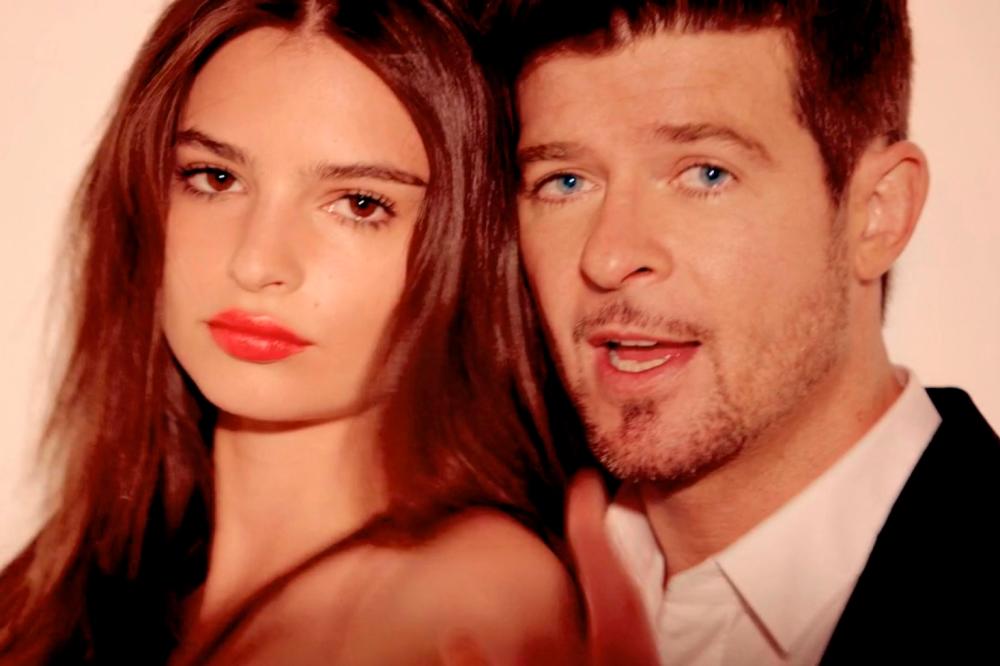 Ratajkowski (left) revealed the harrassment she endured from Thicke on the set of Blurred Lines. - AFP