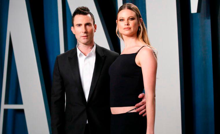 Adam Levine and Behati Prinsloo were seen in public for the first time since the scandal. – Reuters