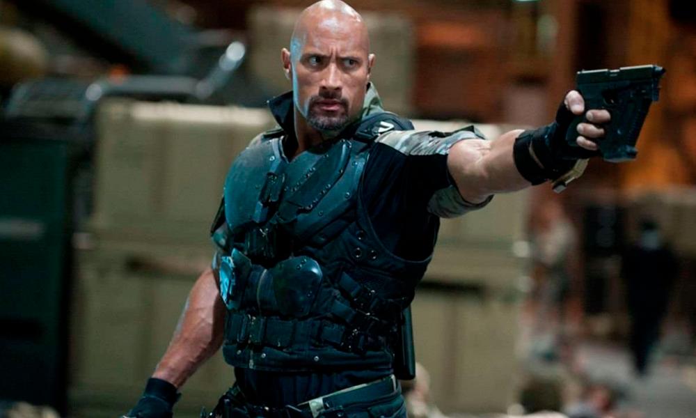 Johnson, seen here in a scene from F9: The Fast Saga, has vowed to only use rubber guns in his future films. - UNIVERSAL PICTURES