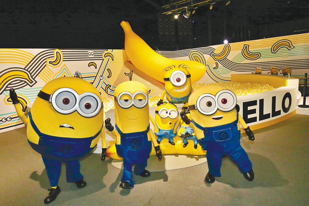 $!The Minions characters posing before an oversize banana.