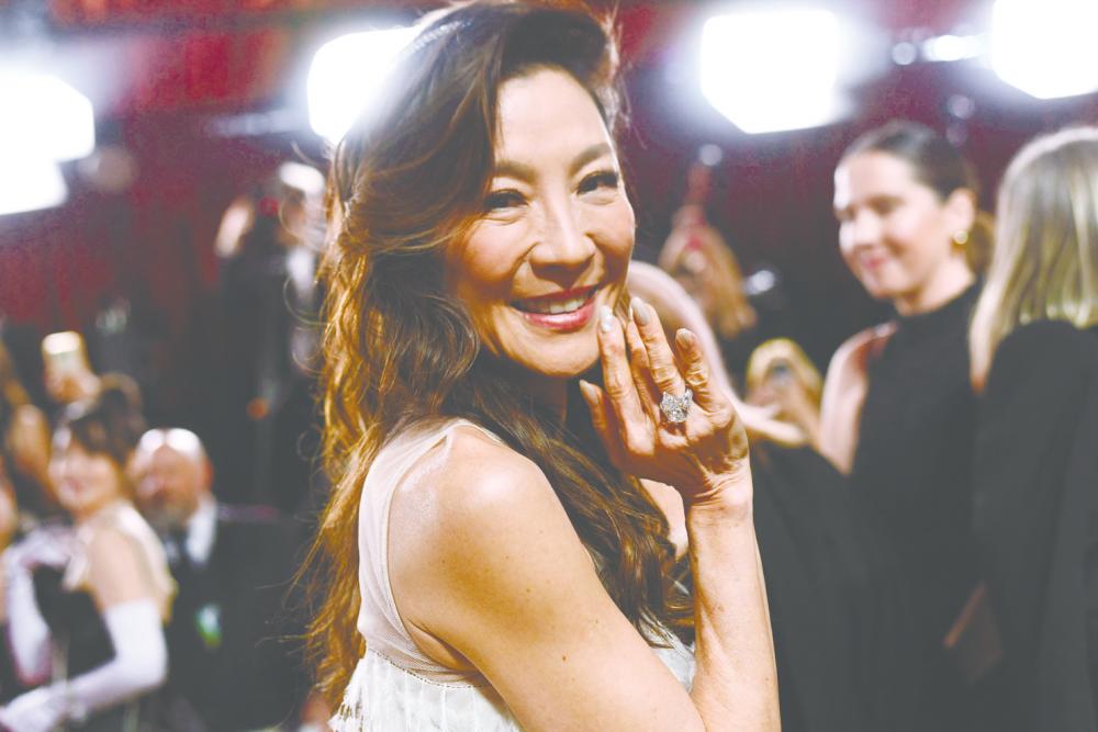 $!Tan Sri Michelle Yeoh is the nation’s first Oscar winner. – AFP