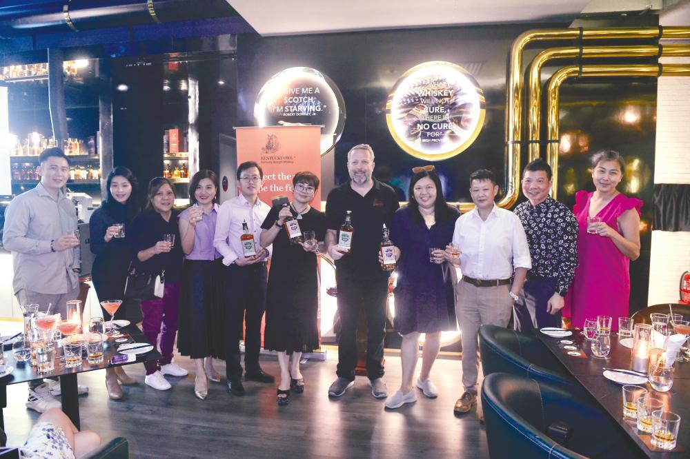 $!(from fifth left) Luen Heng F&amp;B Marketing Brand Manager Ryan Tiu, Catherine Thong, Tom Jones, Single and Available Shareen Yew at the launch of the ultra-premium whiskeys.– ADIB RAWI YAHYA/THESUN