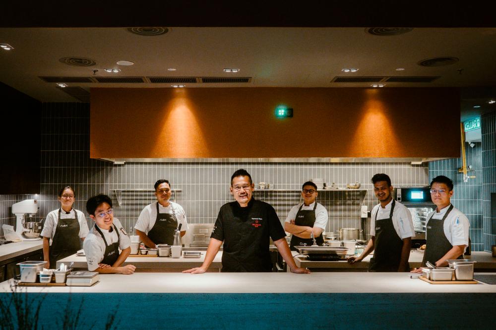 Tham (centre) and the team at Skillet 2.0 are prepared to take diners on a culinary odyssey.