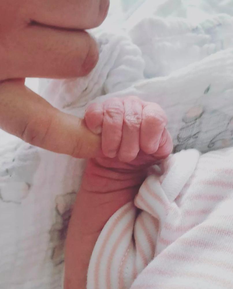 The photo Michael Sheen shared of his new baby. – Twitter