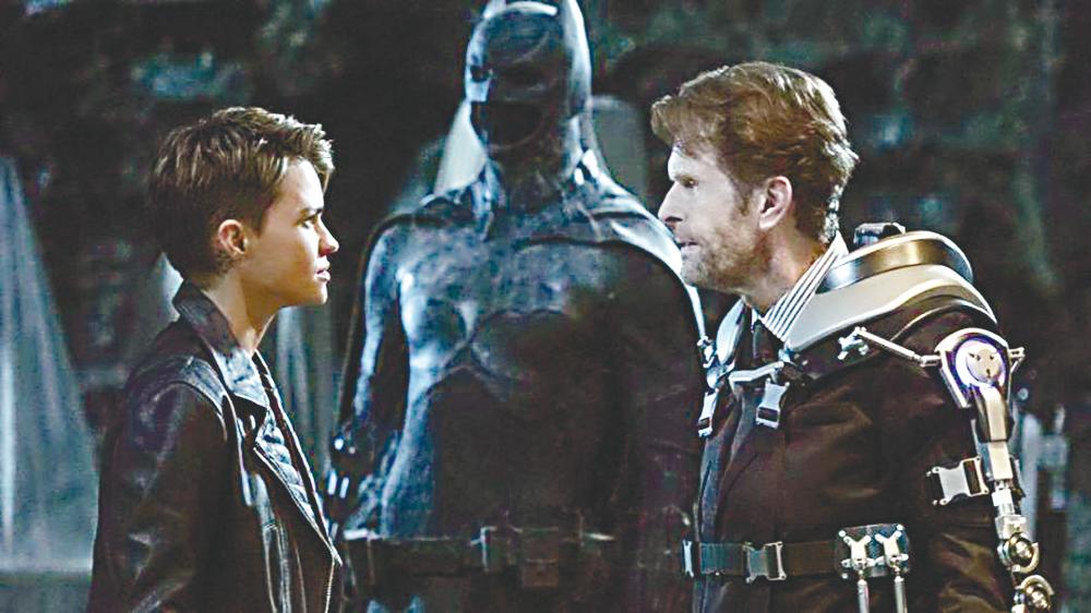 The only time Conroy (right) played Batman in live action was on Batwoman. – THE CW