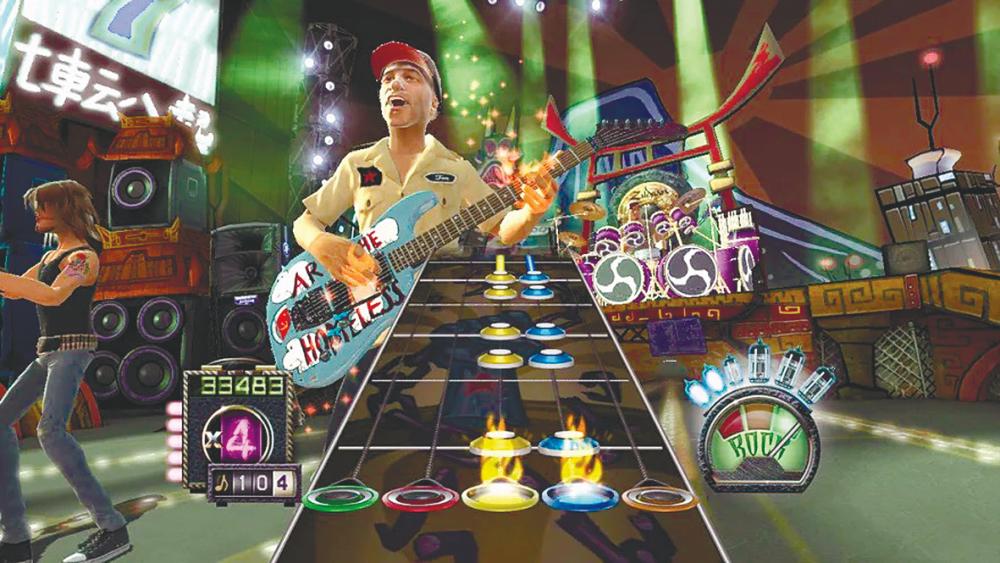 $!Just try not busting a dance move with the Guitar Hero games. – ACTIVISIONPIC