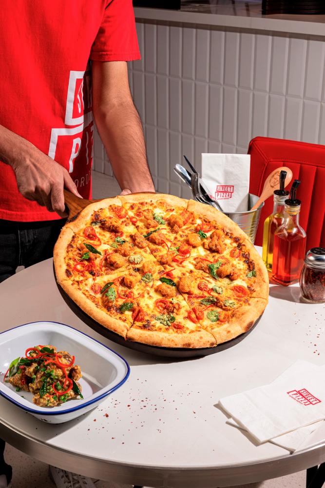 $!New CNY menu rollout in Gordon Ramsay Street Pizza.