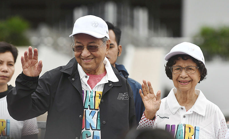 Filepix of Tun Dr Mahathir Mohamad (L) and Tun Dr Siti Hasmah Mohd Ali (R).
