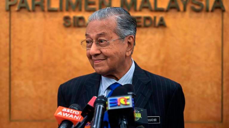 Malaysia should present report on treatment of migrants: Dr Mahathir