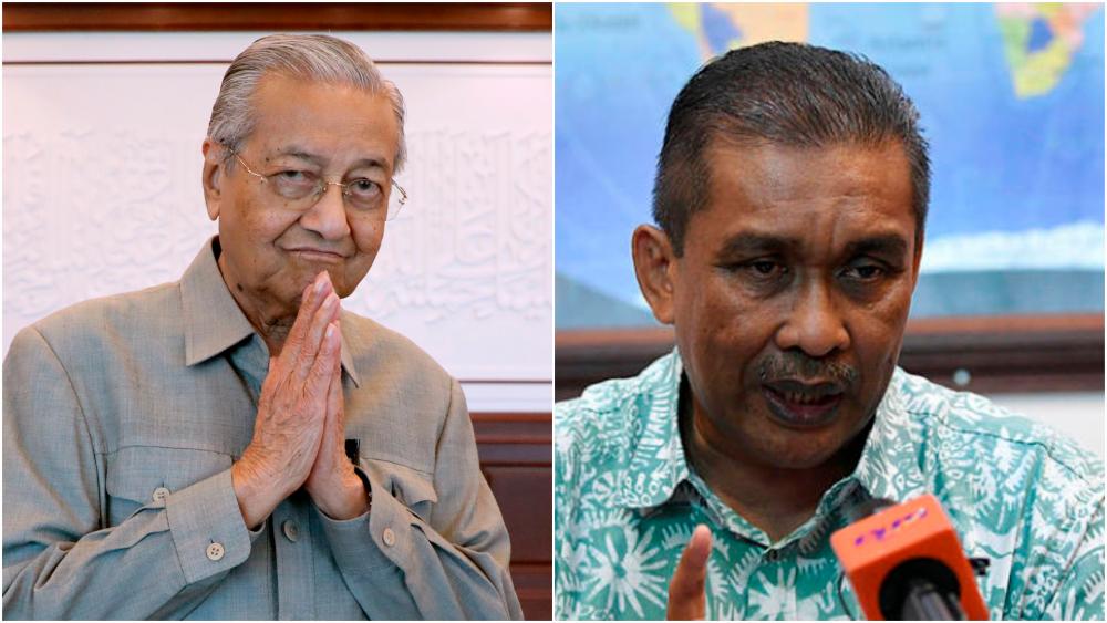 Mahathir (L) and Takiyuddin.