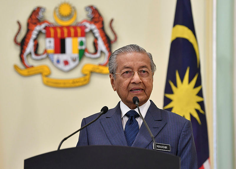 Fake news can be dealt with existing laws: Mahathir (Updated)