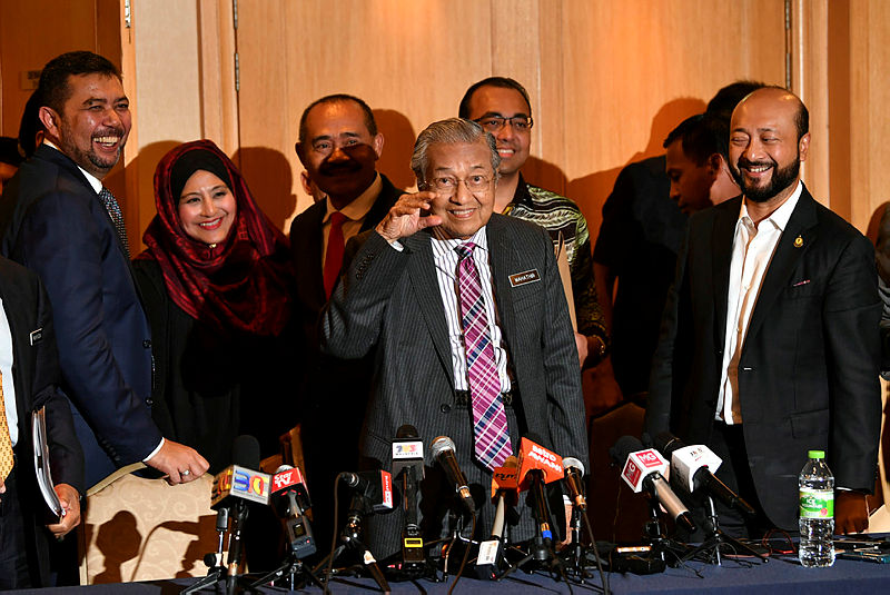 Prime Minister Tun Dr Mahathir Mohamad with Kedah Mentri Besar Datuk Seri Mukhriz Tun Mahathir (R), who is also his son, and Deputy Foreing Minister Datuk Marzuki Yahya (R), after the Bersatu supreme council meeting, on Aug 30, 2019. — Bernama