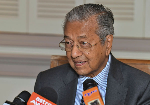 Prime Minister Tun Dr Mahathir Mohamad speaks to the media after concluding his two-day working visit to Fukuoka, Japan. — Bernama