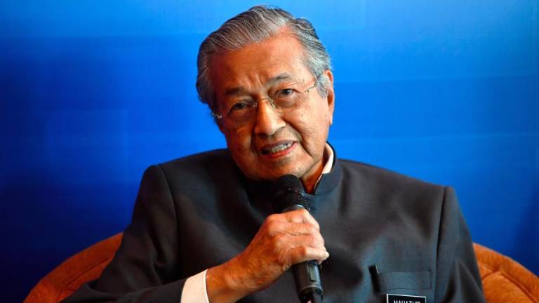 Dr Mahathir declares independent bloc with Warisan