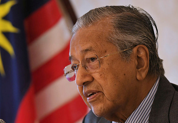 Prime Minister Tun Dr Mahathir Mohamad speaks to the media after concluding his two-day working visit to Fukuoka, Japan. — Bernama