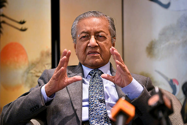 Prime Minister Tun Dr Mahathir Mohamad speaks with members of the Malaysian media at a press conference after attending the second Belt and Road Forum for International Cooperation, Beijing on April 28, 2019. — Bernama