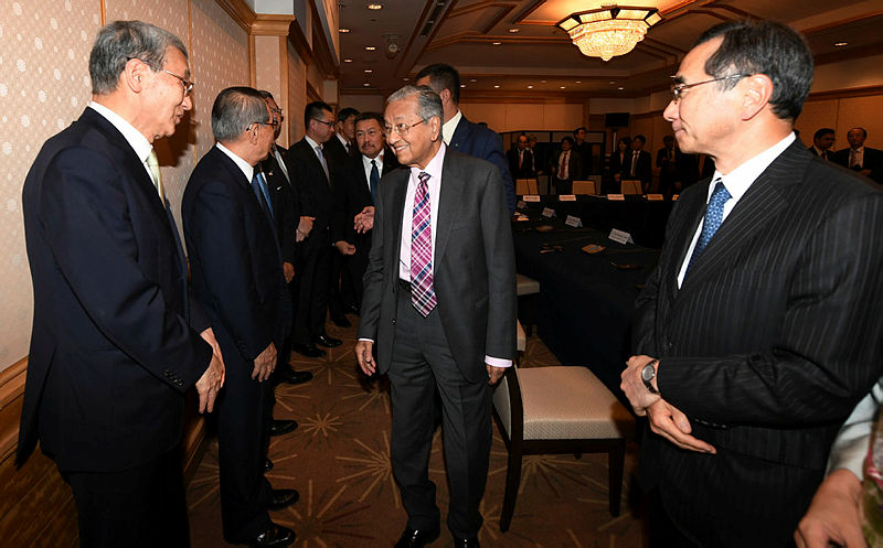 Prime Minister Mahathir Mohamad is greeted upon arrival for the 25th International Conference on The Future of Asia (Nikkei Conference) here, on May 30, 2019. — Bernama
