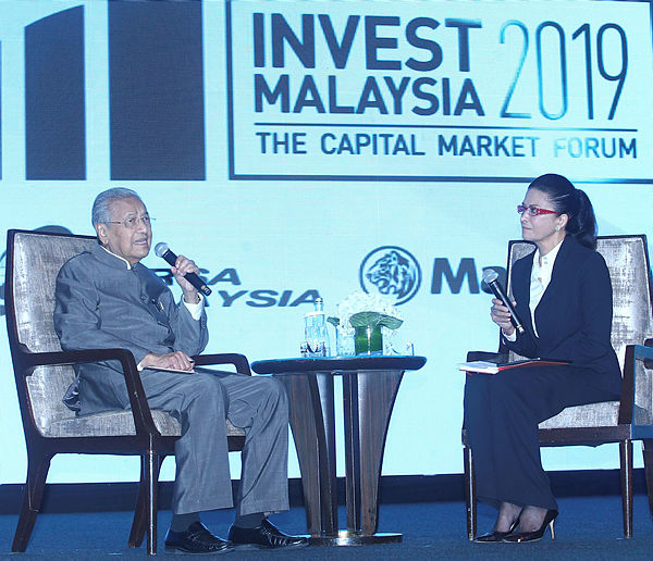 Prime Minister Tun Dr Mahathir Mohamad with Bursa Malaysia Chairman Datuk Shireen Ann Zaharah during a Q&amp;A session at the Invest Malaysia 2019, on March 19, 2019. — Sunpix by Zulkifli Ersal