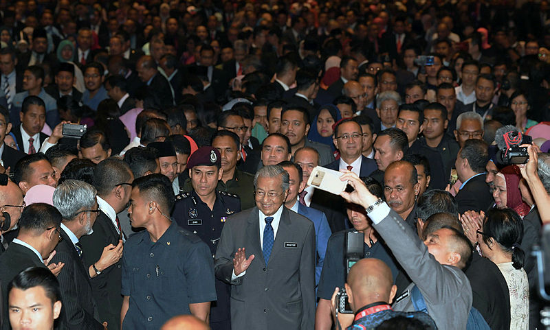 Prime Minister Tun Dr Mahathir Mohamad is greeted by guests upon arrival for the national level Teachers’ Day 2019 celebrations, in Penang, on May 16, 2019. — Bernama