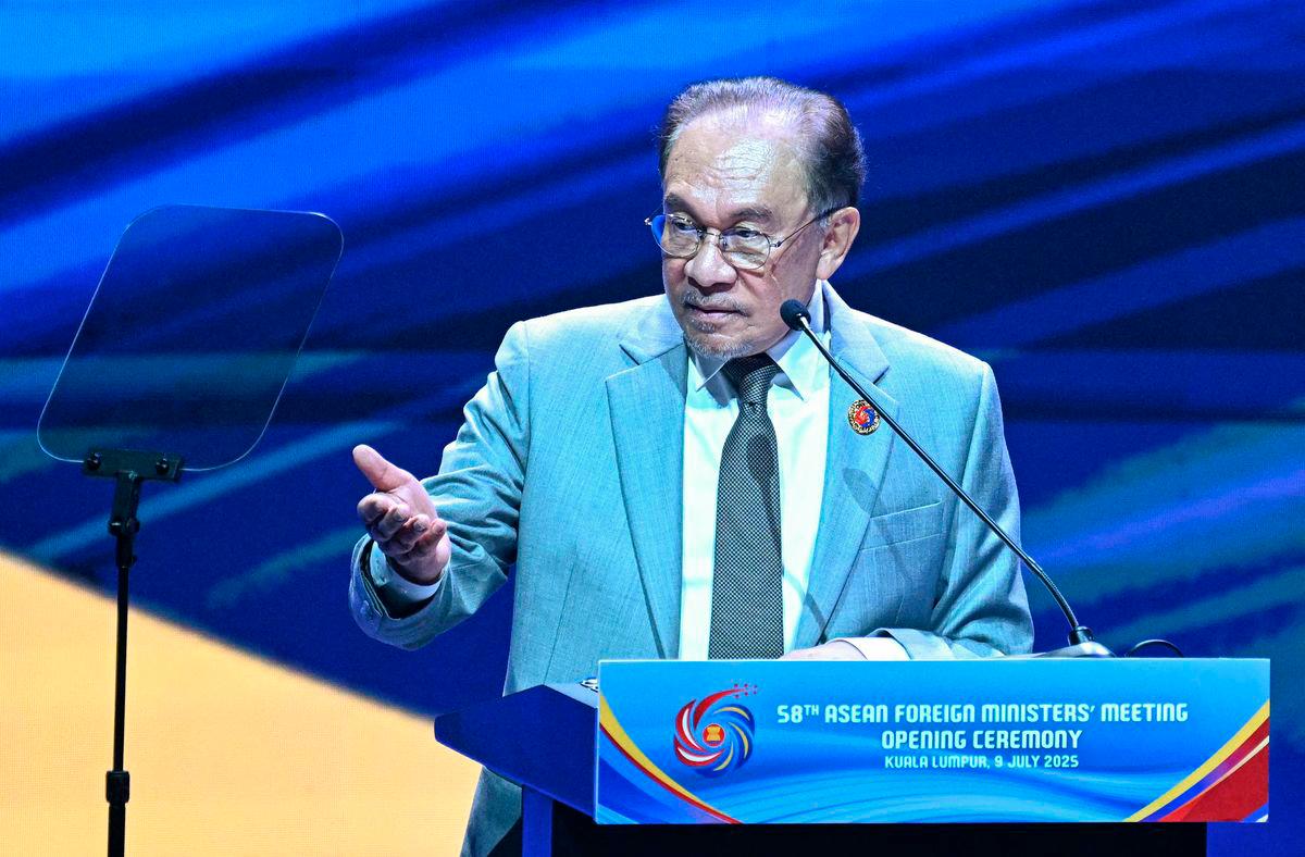 Prime Minister Anwar Ibrahim delivers his keynote address during the opening ceremony of the 58th Association of Southeast Asian Nations (ASEAN) Foreign Ministers’ meeting and related meetings at the Convention Centre in Kuala Lumpur on July 9, 2025. (Photo by MOHD RASFAN / AFP)