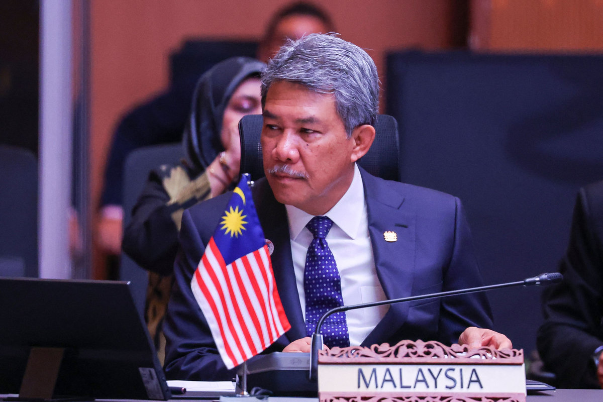 Malaysia's Minister of Foreign Affairs Mohamad Hasan attends the Association of Southeast Asian Nations (ASEAN) Post-Ministerial Conference with the United Kingdom during the 58th ASEAN Foreign Ministers’ meeting and related meetings at the Convention Centre in Kuala Lumpur on July 11, 2025. - Pool via AFP