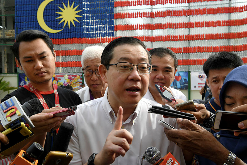 Finance Minister Lim Guan Eng talks to the media after officiating the giant Jalur Gemilang made out of 2,002 bottles of mineral water by the pupils of SRJK (C) Chung Hwa Pusat, Butterworth on Aug 25, 2019. — Bernama