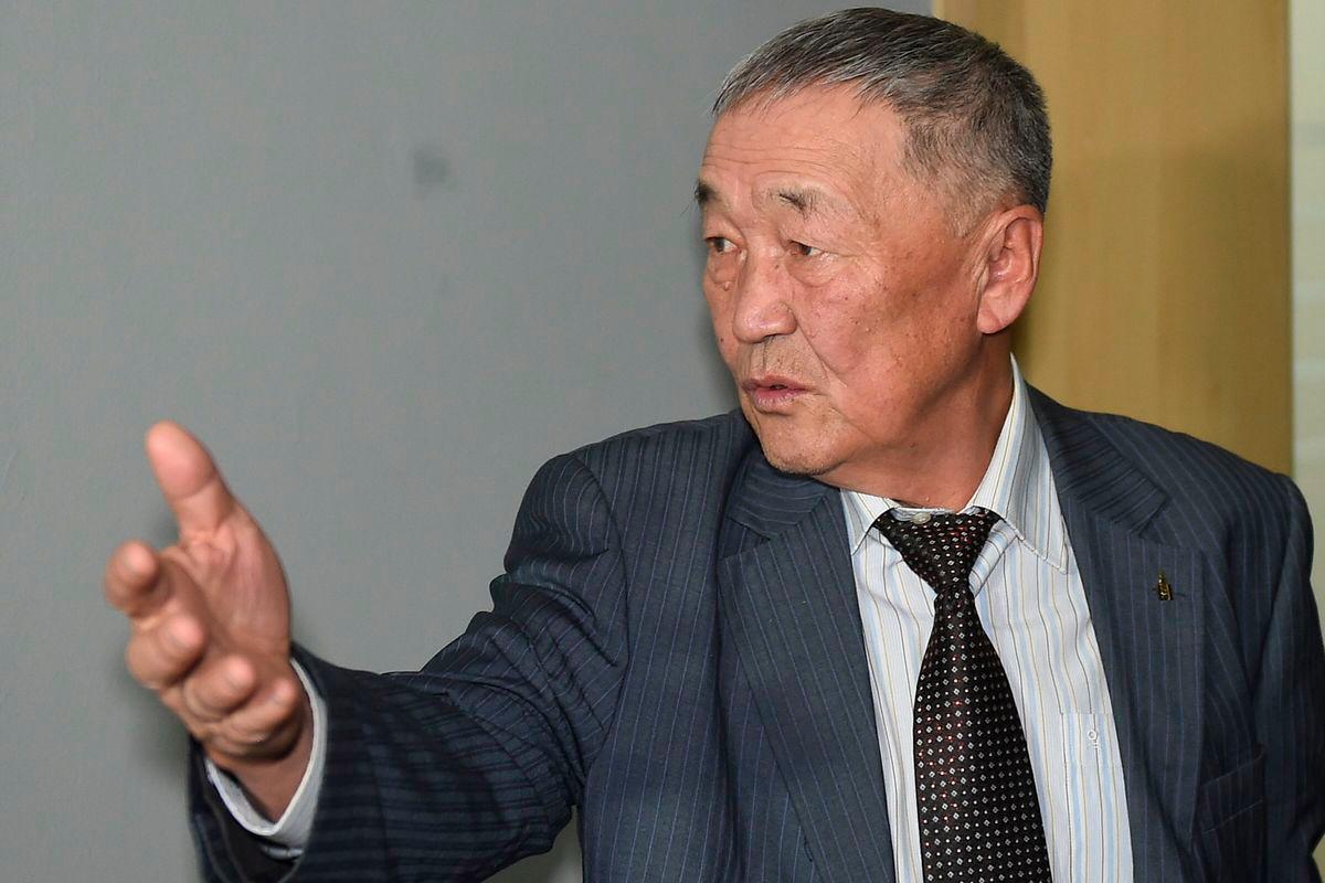 Setev Shaariibuu, the father of murdered young Mongolian woman Altantuya Shaariibuu, who is expected to testify in a civil lawsuit into her daughter's murder arrives in court in Sha Alam on January 22, 2019. - AFP