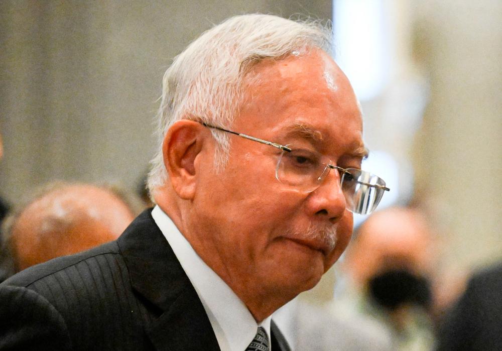 Najib, 69, is facing four charges of using his position to obtain bribes totalling RM2.3 billion from 1MDB funds and 21 charges of money laundering involving the same amount. AFPPIX