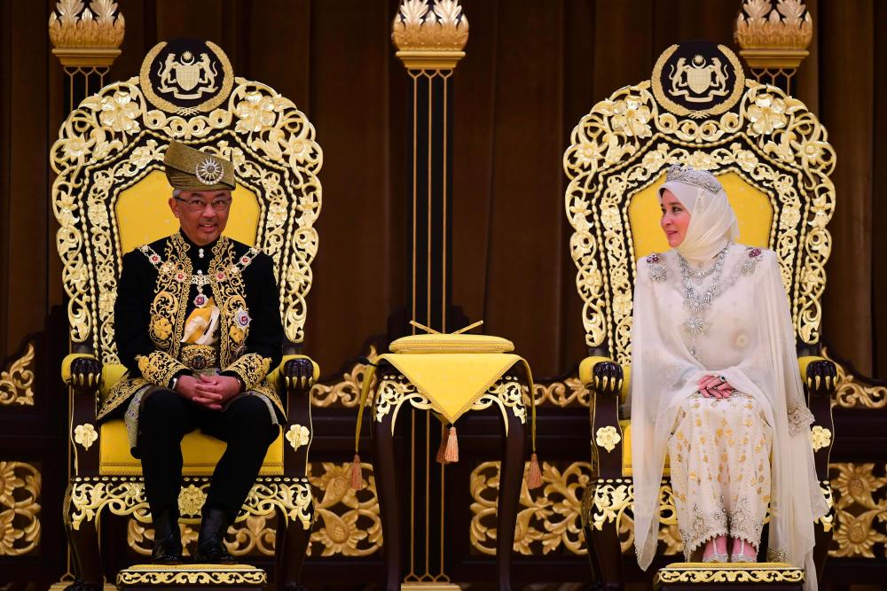 Al-Sultan Abdullah Ri’ayatuddin Al-Mustafa Billah Shah and Tunku Hajah Azizah Aminah Maimunah Iskandariah. - AFP