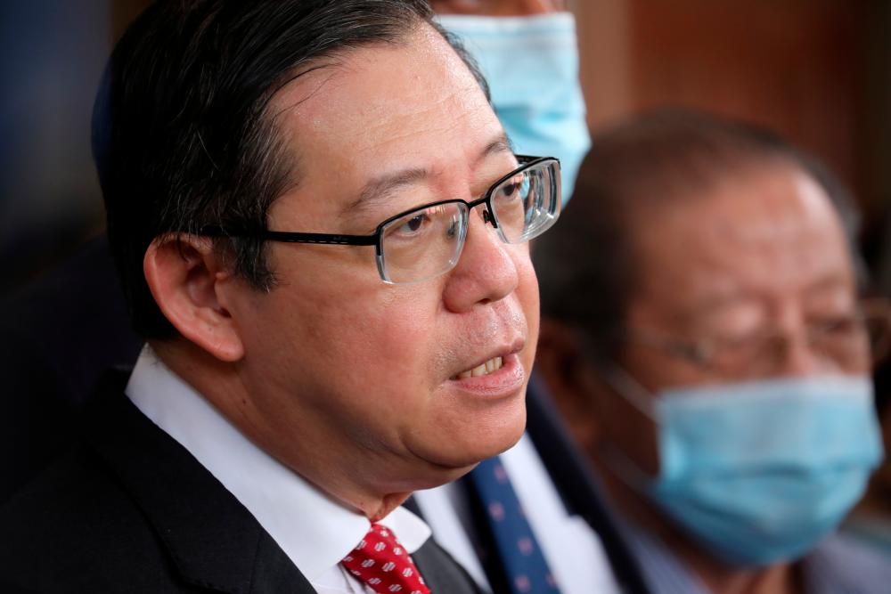 Former finance minister Lim and current DAP secretary-general Lim Guan Eng speaks during a news conference outside the Kuala Lumpur High Court on August 7, 2020. - Reuters