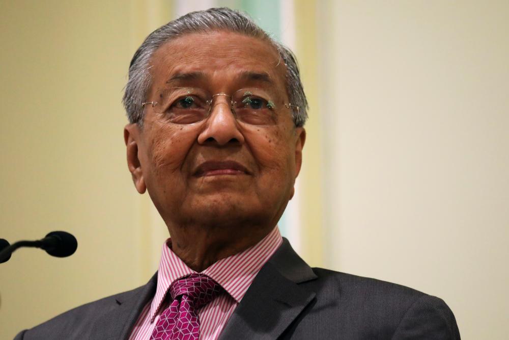 Prime Minister Tun Dr Mahathir Mohamad reacts during a news conference in Putrajaya, Malaysia, September 18, 2019. - Reuters
