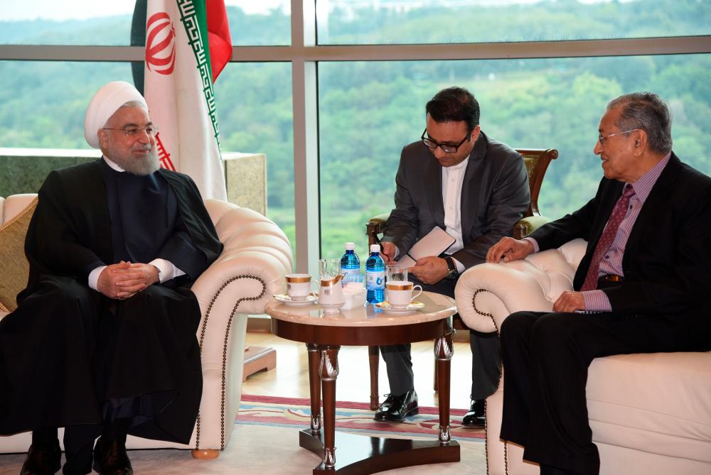 Prime Minister Tun Dr Mahathir Mohamad meets with Iranian President Hassan Rouhani at the Prime Minister Office in Putrajaya, December 18, 2019. - Reuters