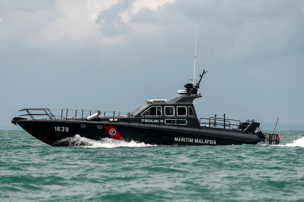 A Malaysian Maritime Enforcement Agency boat off the Johor coast of Malaysia on Aug 24, 2017. — AFP