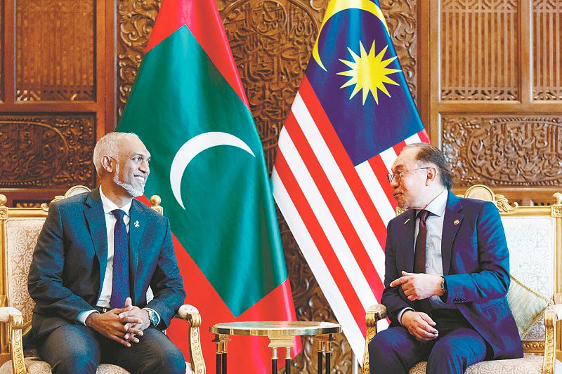 Anwar and Muizzu at their meeting at Bangunan Perdana Putra in Putrajaya yesterday. – PIC COURTESY OF PRIME MINISTER’S OFFICE