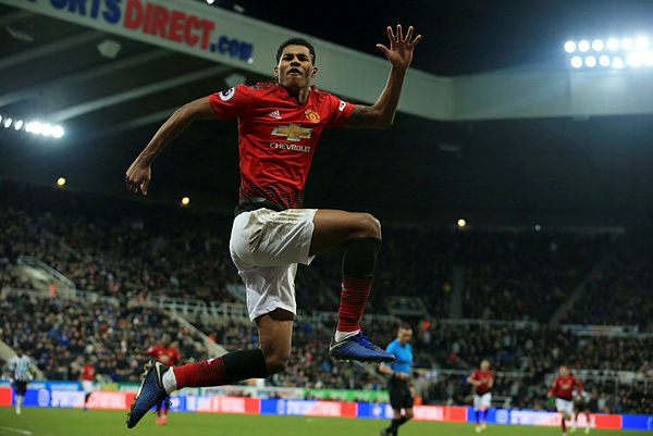 Photo taken on January 2, 2019, Manchester United’s English striker Marcus Rashford celebrates scoring his team’s second goal during the English Premier League football match between Newcastle United and Manchester United at St James’ Park in Newcastle-upon-Tyne. — AFP