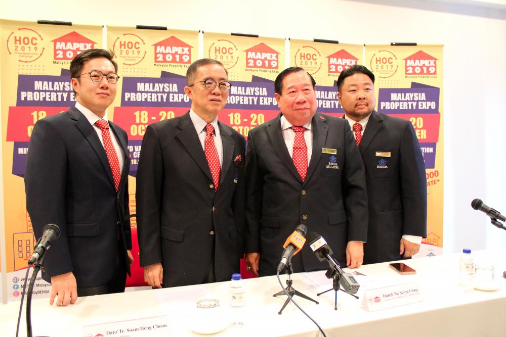 From left: MAPEX 2019 committee member Chan Kin Meng, REHDA president Datuk Soam Heng Choon, Ng and MAPEX 2019 committee member Tiah Oon Ling.