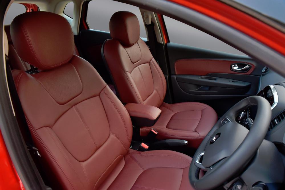Maroon combination leather seats. $!Maroon combination leather seats.