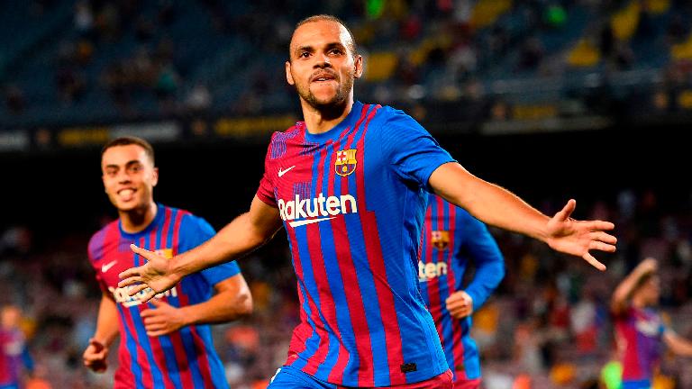 Barcelona’s Martin Braithwaite (left) celebrates after scoring his second goal during the Spanish La Liga match against Real Sociedad at the Nou Camp on Sunday. – AFPPIX