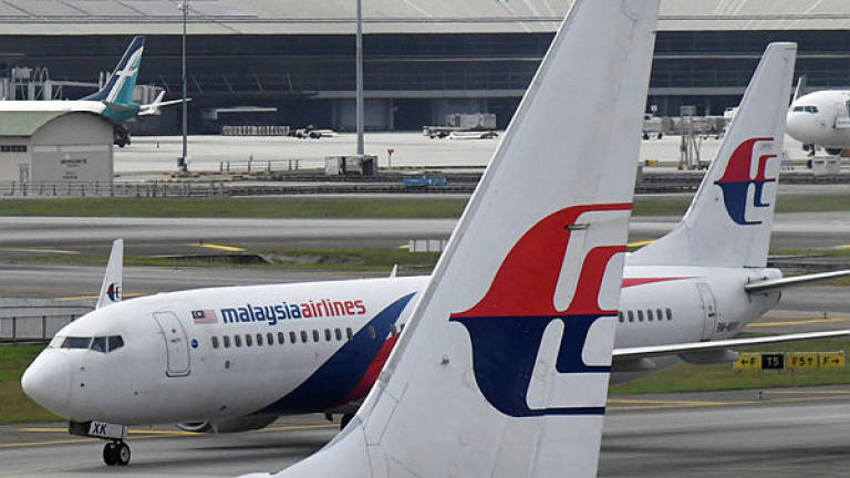 Malaysia Airlines planes are pictured at Kuala Lumpur International Airport, July 2, 2019. — Reuters