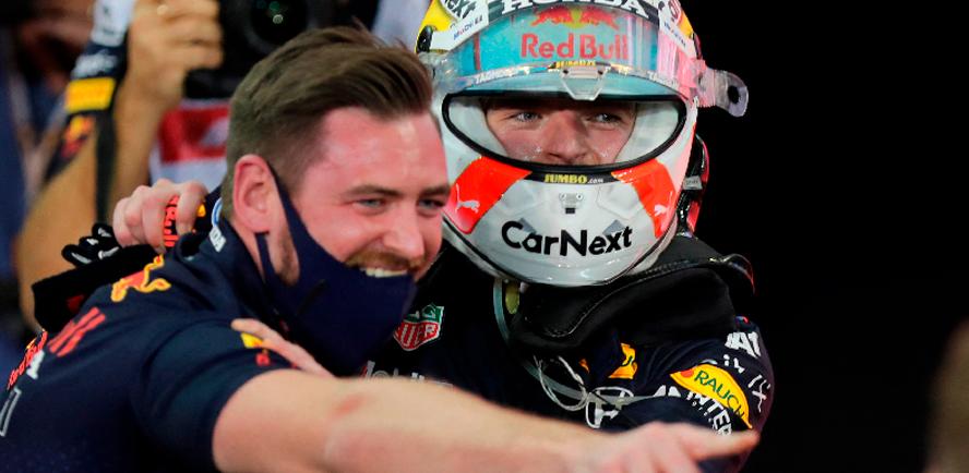 Red Bull’s Max Verstappen (right) celebrates winning the race and the world championship with teammates at the Abu Dhabi Grand Prix in Yas Marina Circuit. – REUTERSPIX