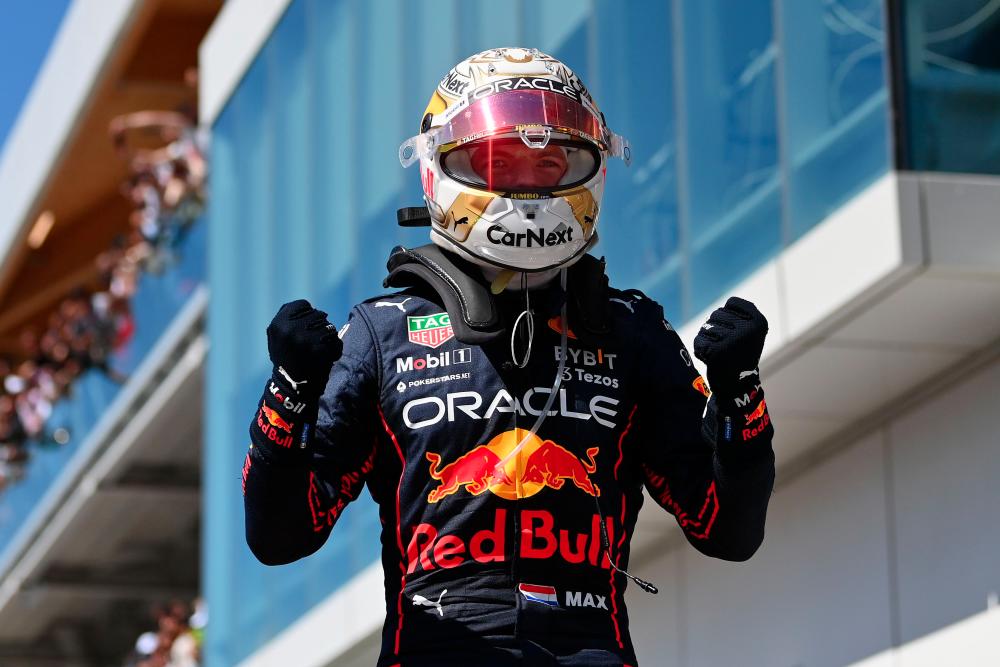 Race winner Max Verstappen of the Netherlands and Oracle Red Bull Racing celebrates in parc ferme during the F1 Grand Prix of Canada at Circuit Gilles Villeneuve on June 19, 2022 in Montreal, Quebec. AFPpix